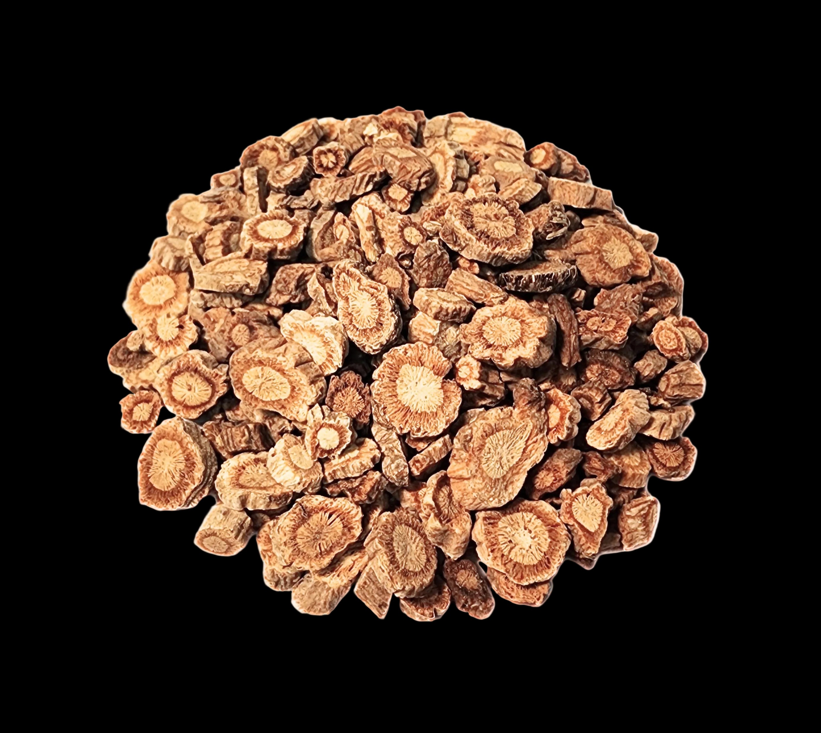 Heap of dried root pieces on a white background