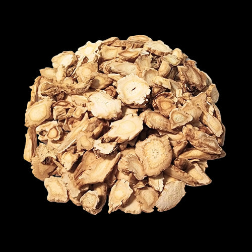 Heap of dried herbs with a USDA Organic label on a white background