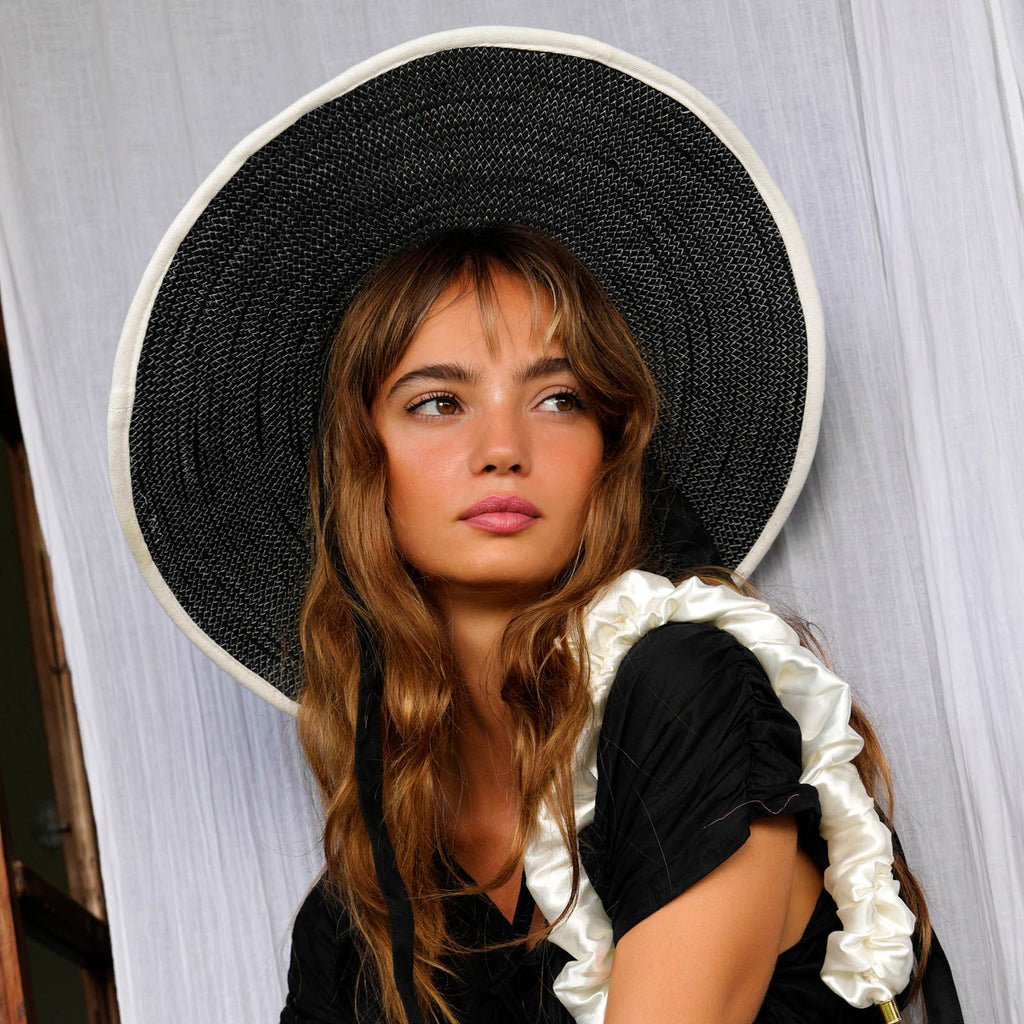 The Lolo Wide-brim Jute Boater Hat in Black